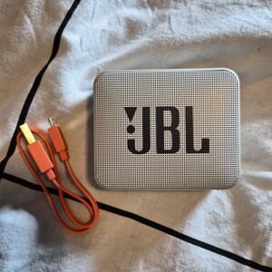 JBL Portable Bluetooth Speaker in Grey with Orange Cable